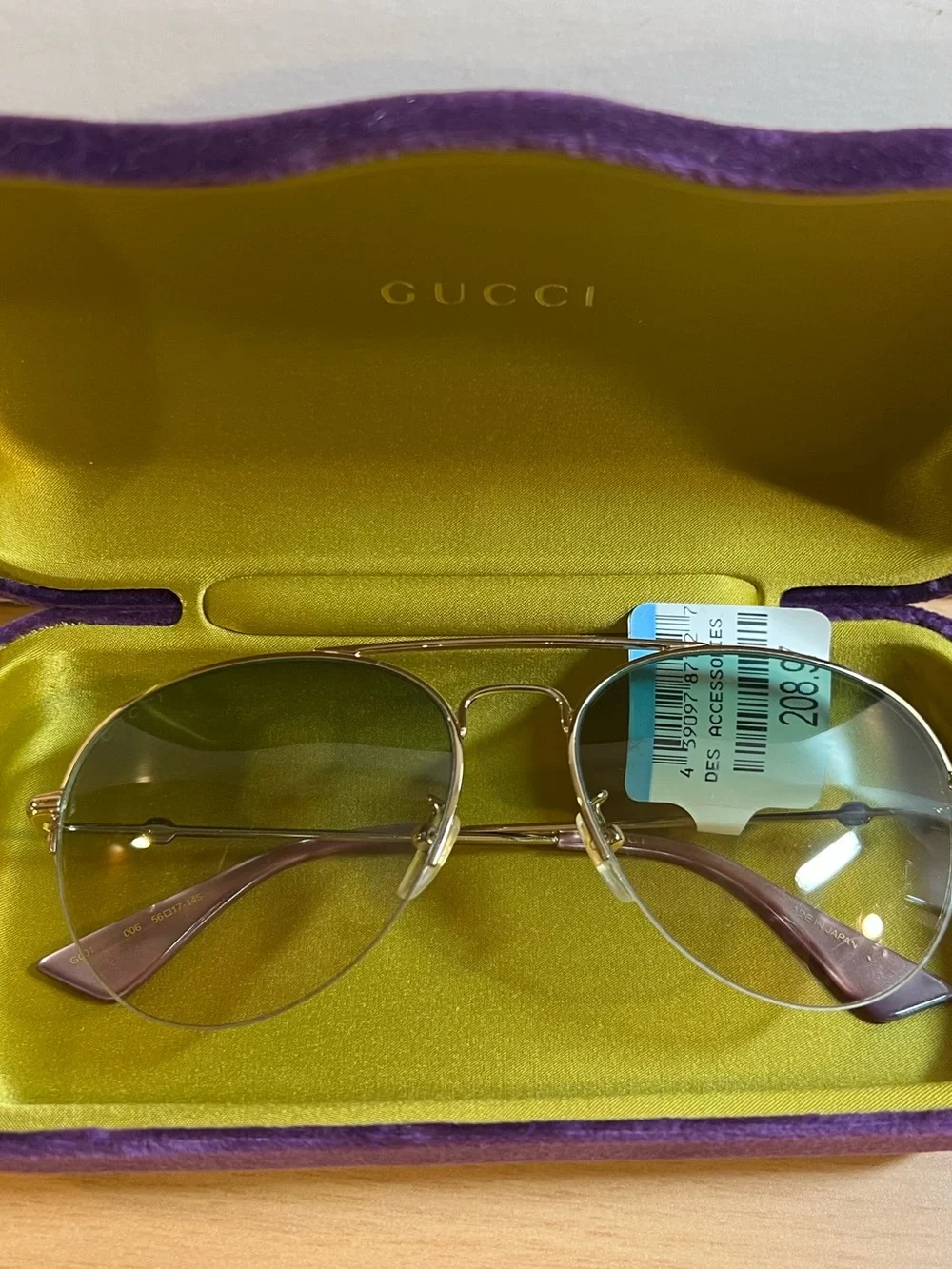 Gucci Men’s Gold Frame Sunglasses with Green Lenses $150